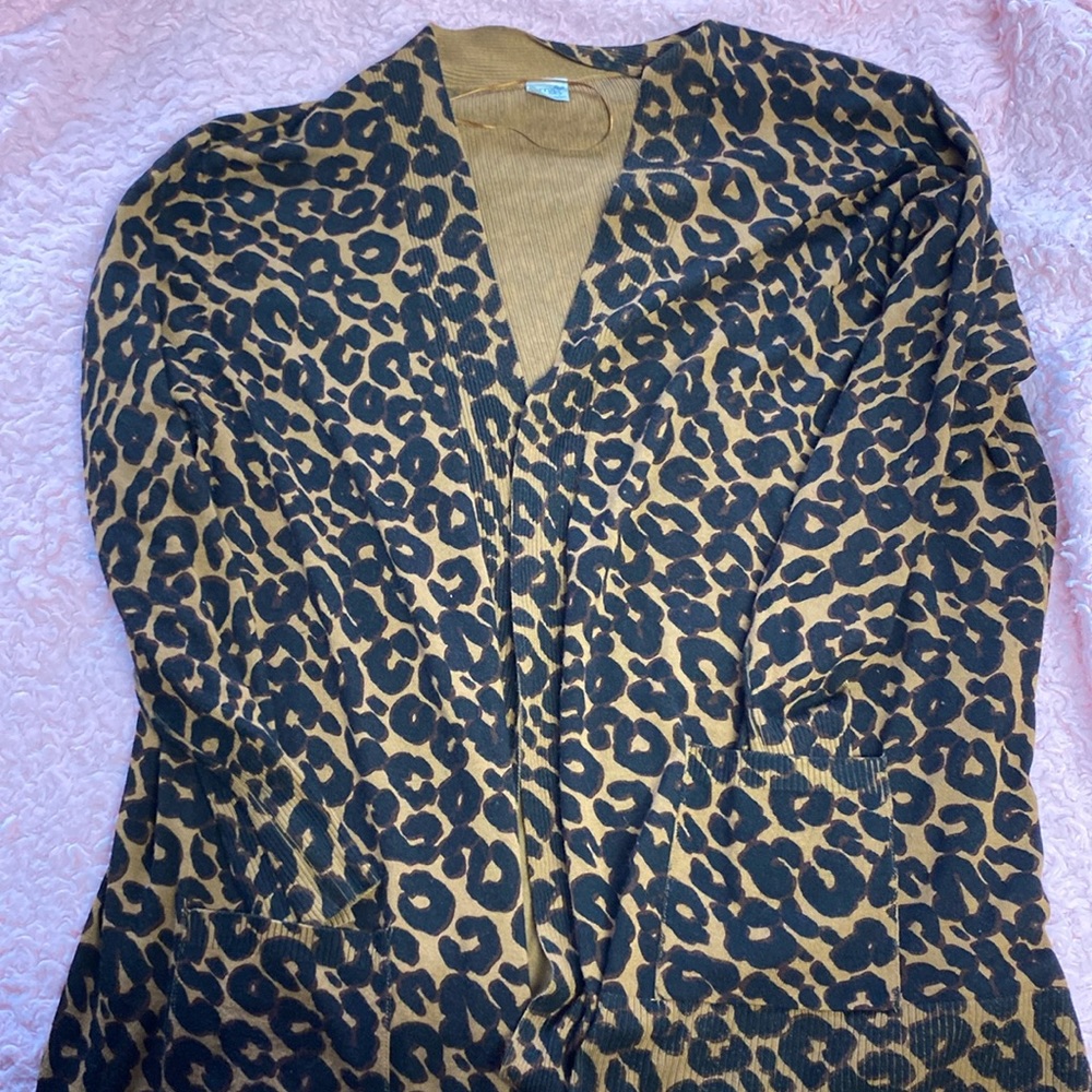 Leaped print cardigan, only worn once , size 3x but fits loosely